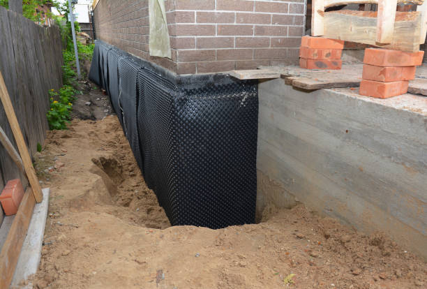 SJ Waterproofing Pros technician performing targeted Waterproofing assessment in Riegelsville, PA